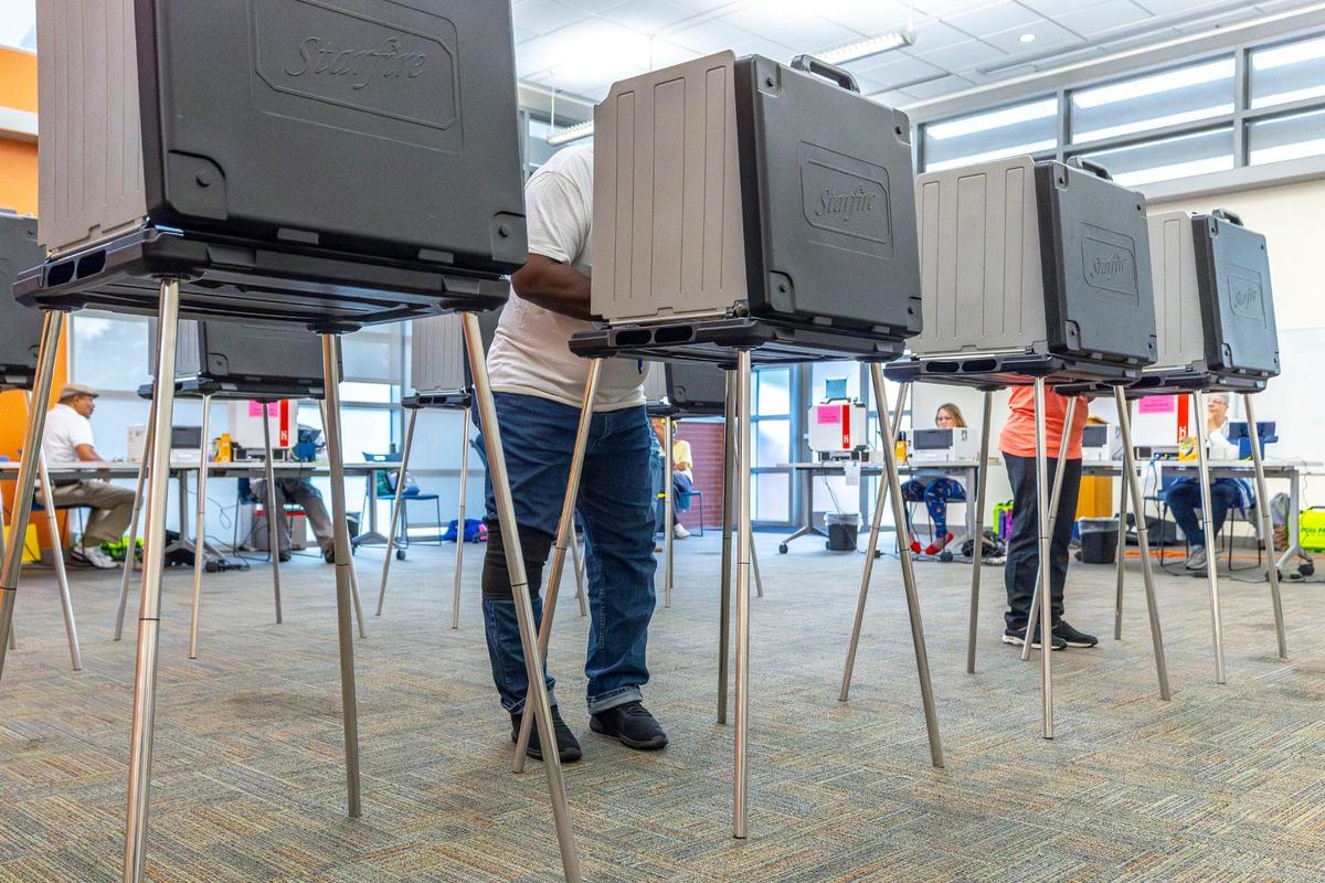 Voters complete their ballots at Lexington Public Library’s Northside Branch in Lexington, Ky., on Tuesday, May 21, 2024.