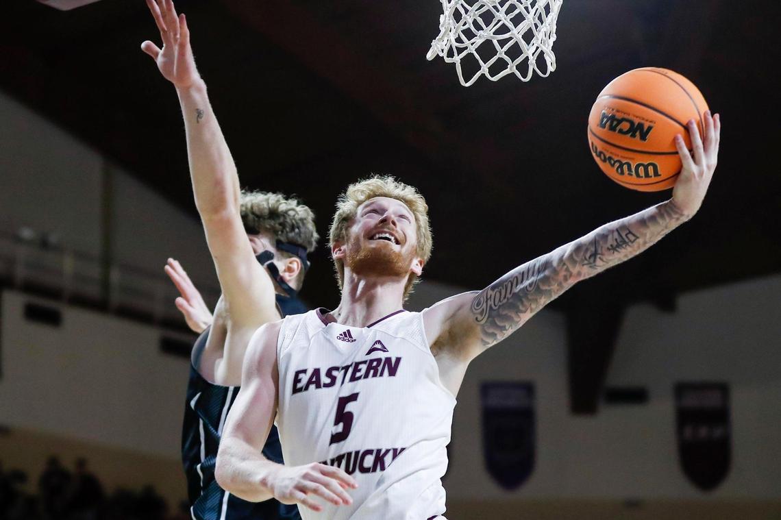 Eastern Kentucky’s Cooper Robb (5) drives to the basket against North Alabama during their ASUN Tournament quarterfinal game Tuesday night in Richmond.