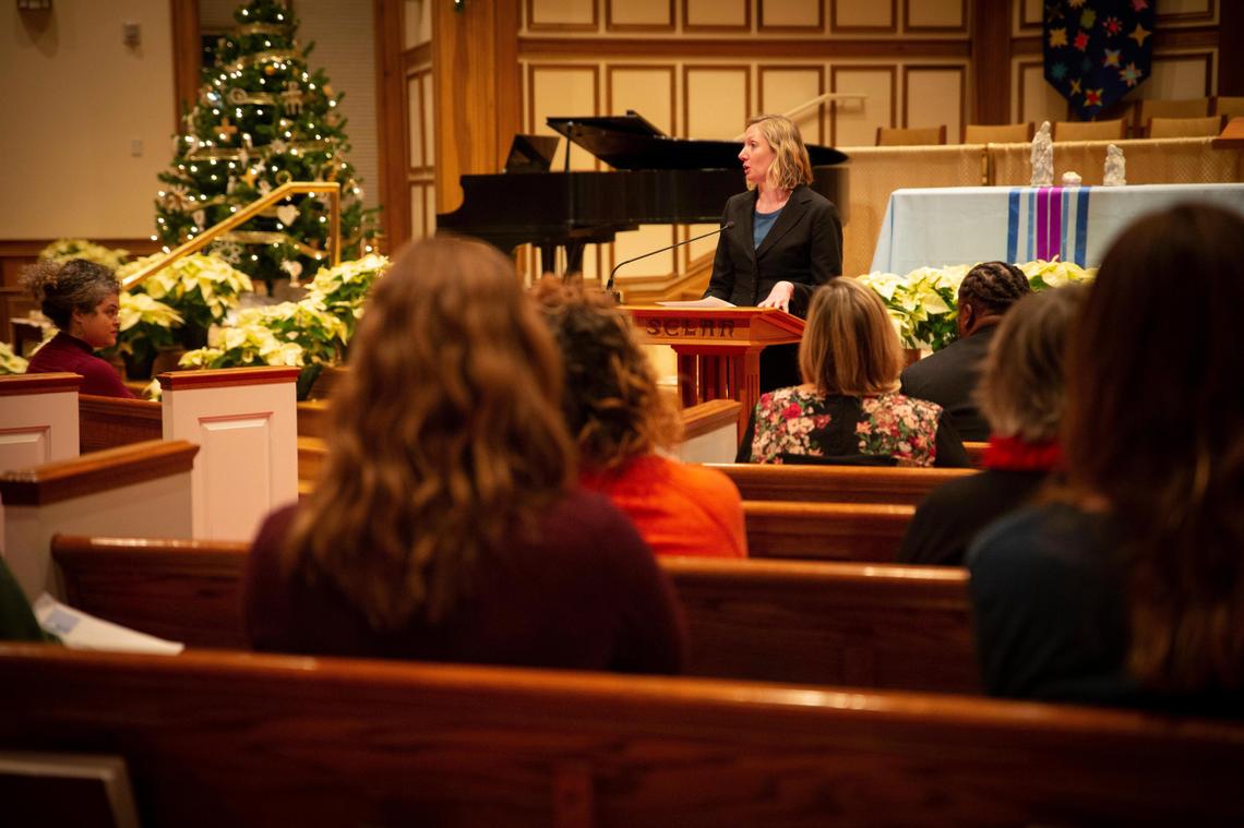 Ashley Spalding gives background information about bail practice and policy during the Justice Through Bail Reform forum at Central Baptist Church in Lexington, Ky., on Tuesday, Dec. 10, 2019.