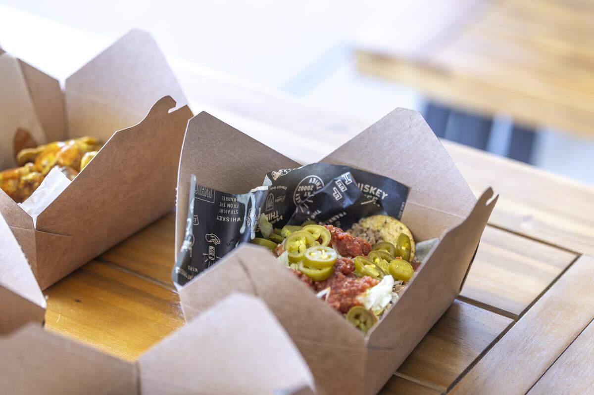 A food truck offering burgers, sandwiches, wings, brats and more is open Thursdays to Sundays at Whiskey Thief Distilling Co. in Frankfort, Ky., on Thursday, May 7, 2026.