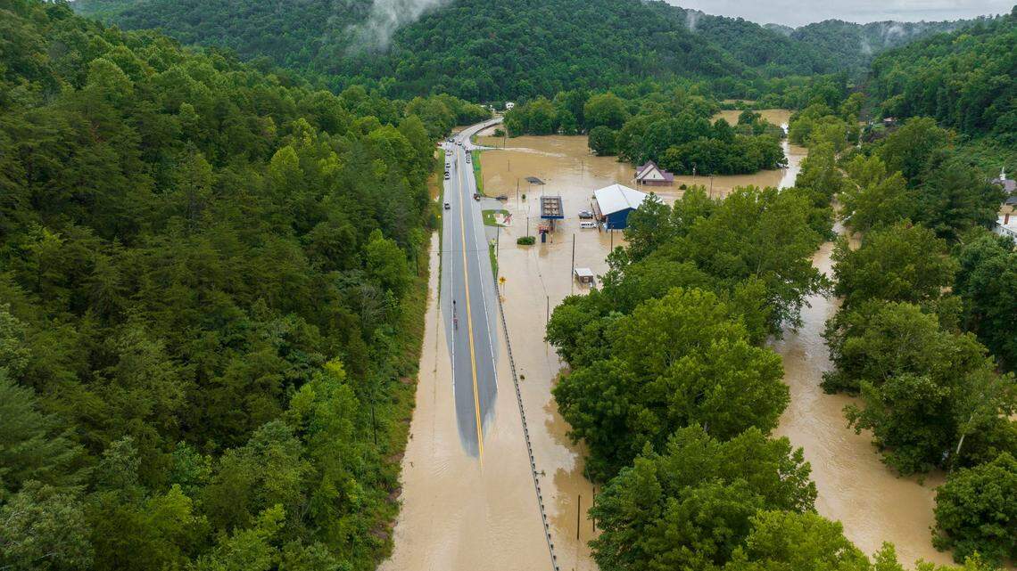 Buildings and roads were flooded near Lost Creek, Ky., Thursday, July 28, 2022.