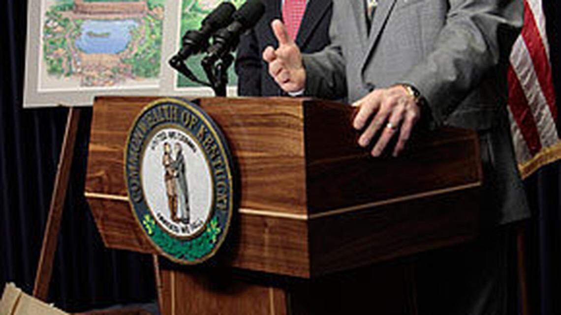 Governor Steve Beshear, left and Mike Zovath, senior vice president of Answers in Genesis  answered questions after they announced Ark Encounter at the Kentucky State Capitol in Frankfort, Ky., on Wednesday Dec. 1, 2010.  The for-profit creation-based theme park is planned to be completed in 2014 on an 800 acre site in northern Kentucky. In the background are artist concepts of the ark, left and the park.  Photo by Pablo Alcala | Staff