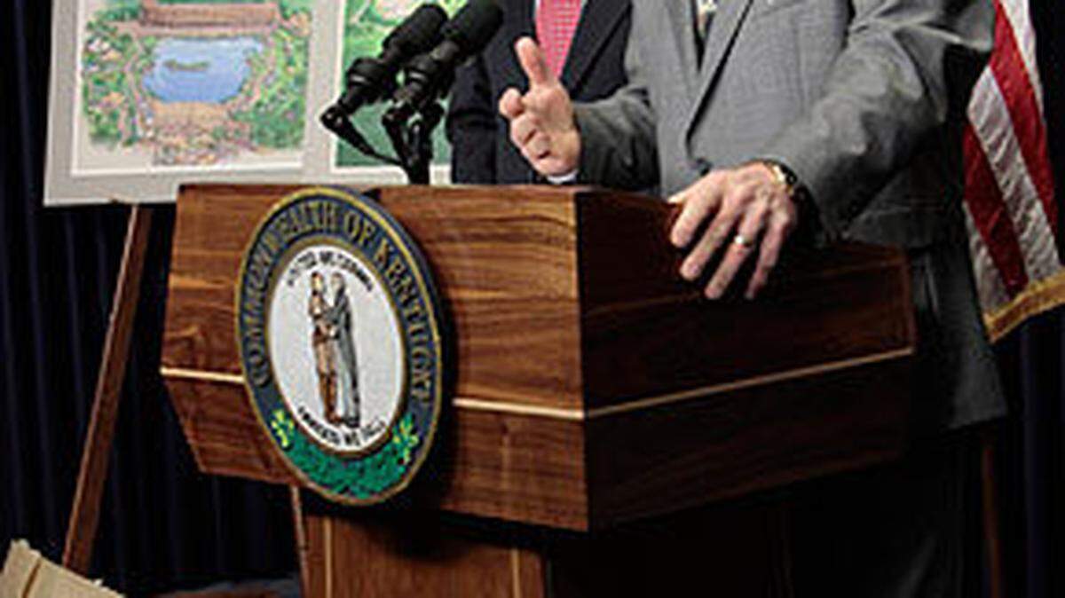 Governor Steve Beshear, left and Mike Zovath, senior vice president of Answers in Genesis  answered questions after they announced Ark Encounter at the Kentucky State Capitol in Frankfort, Ky., on Wednesday Dec. 1, 2010.  The for-profit creation-based theme park is planned to be completed in 2014 on an 800 acre site in northern Kentucky. In the background are artist concepts of the ark, left and the park.  Photo by Pablo Alcala | Staff