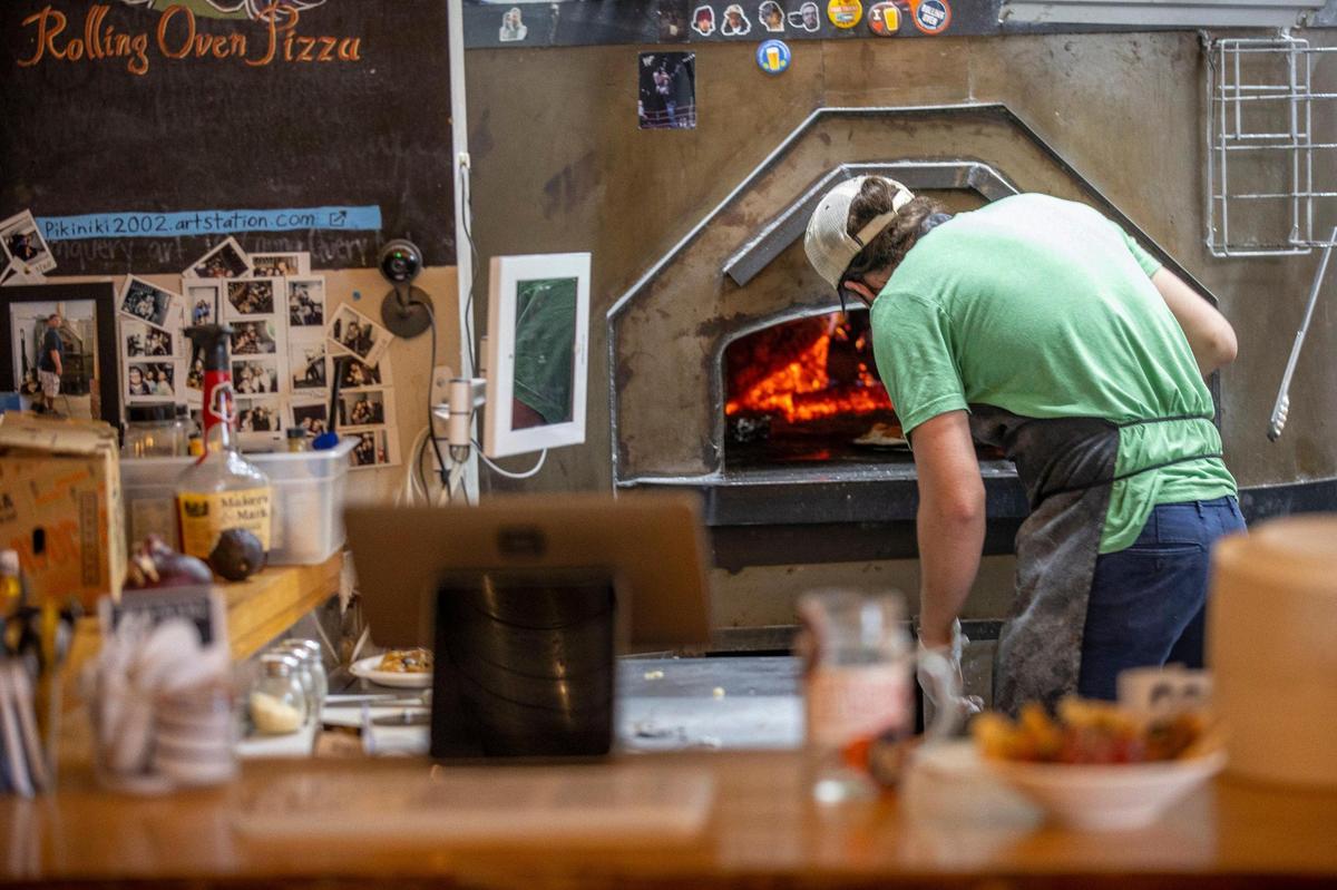 Pizzas at Rolling Oven are cooked inside a wood-fired oven Mirror Twin Brewing Co. at 725 National Ave. in Lexington.