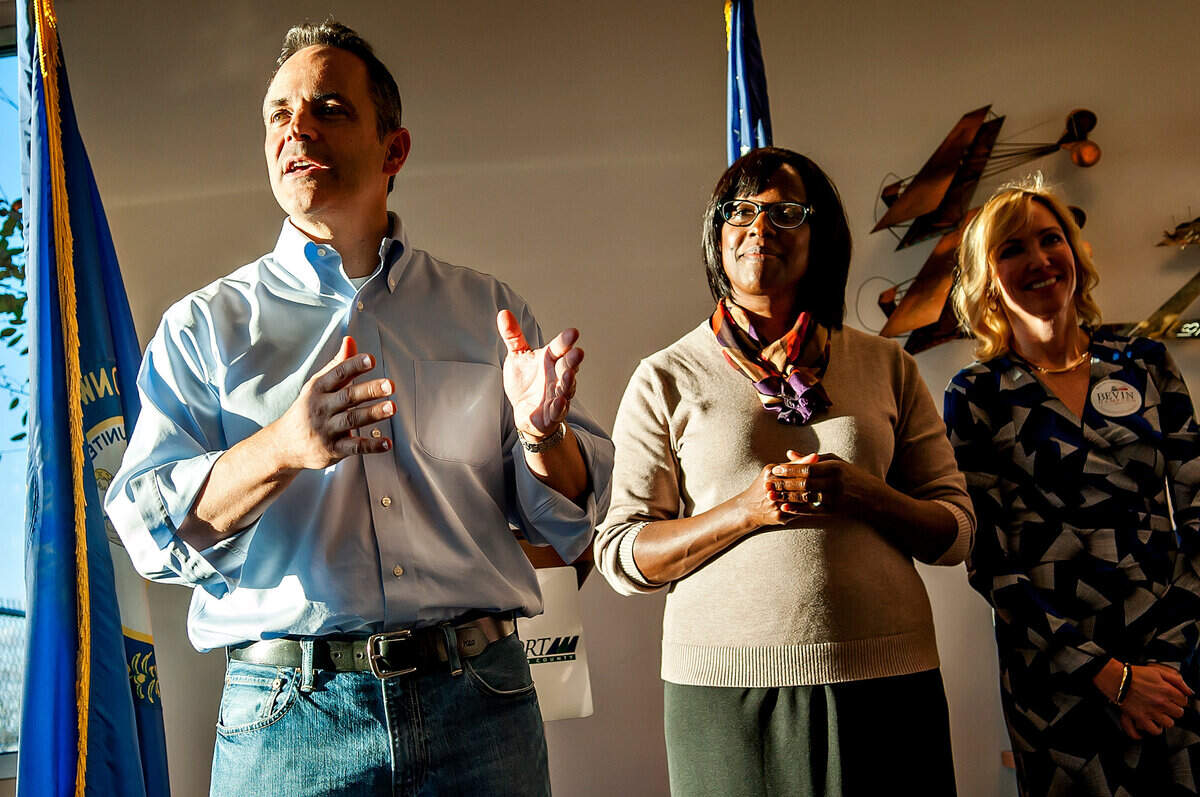 Republican Kentucky gubernatorial candidate Matt Bevin (from left) speaks Monday, November 2, 2015, in front of his running mate Jenean Hampton and Kelley Paul during a Republican rally at Bowling Green-Warren County Regional Airport. (Bac Totrong/photo@bgdailynews.com)