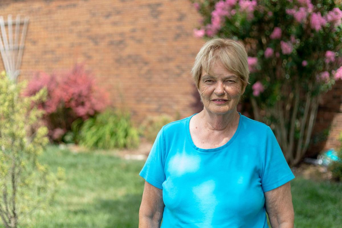 Sharon Slone poses for a portrait outside her home in Richmond, Ky., Tuesday, July 27, 2020. Slone recently went back to her job at a gas station after her unemployment did not go through. Slone lives with her daughter, April Payne, both have medical complications like diabetes in addition to immune compromising conditions making them high risk to catch the novel coronavirus. Without receiving unemployment insurance benefits Slone has had to return to work in order to afford food and medication, but she fears that she will have to quit work again if the rate of the virus rises any more. “I don’t have anything else I can quit paying for,” Slone said.