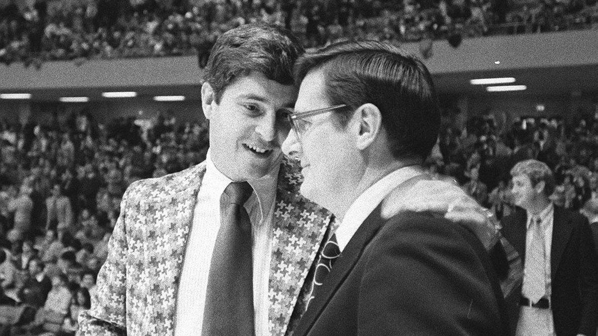 Indiana head coach Bob Knight, left, talks with UK head coach Joe B. Hall prior to the Mideast Regional championship game in Nashville on March 17, 1973, in Nashville. Indiana won that game and also beat Kentucky earlier in the 1972-73 season, which was Hall’s first as the leader of the Wildcats.