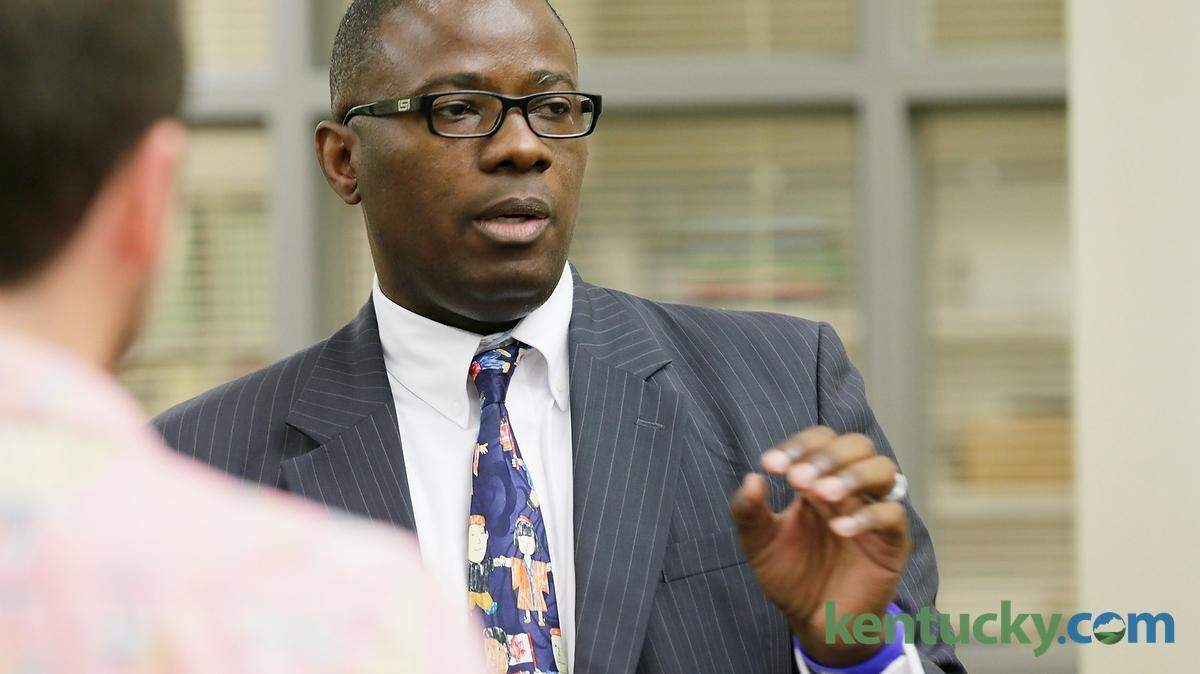 Superintendent Manny Caulk talked to students in the library of Bryan Station High School on the first day of school in August.