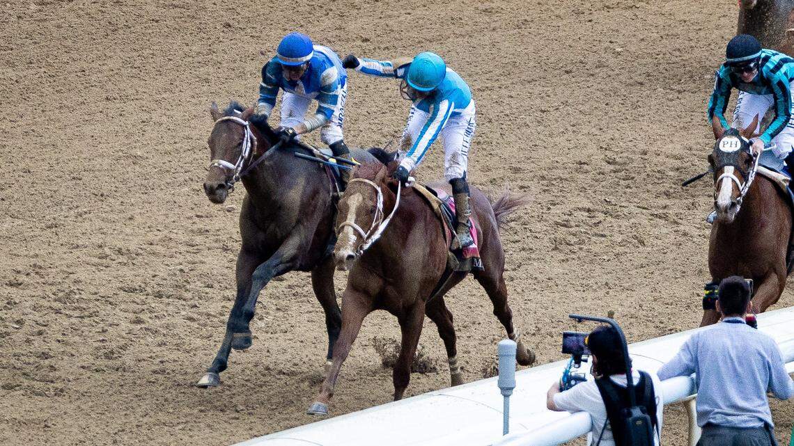 Javier Castellano celebrates after riding Mage past the finish line to win the 149th running of the Kentucky Derby at Churchill Downs on Friday, May 6, 2023, in Louisville, Ky. (Jack Weaver/Herald-Leader)