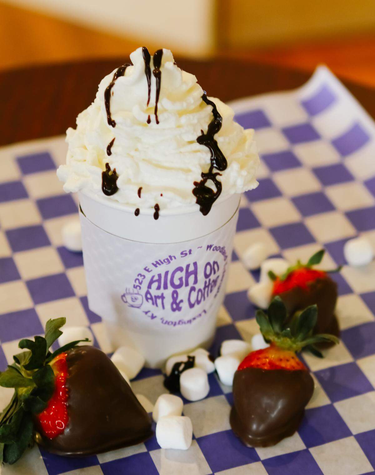 The Cupid’s Arrow, a dark chocolate/strawberry latte with toasted marshmallow whipped cream will be a featured drink from High on Art & Coffee.