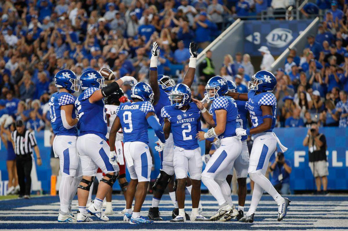 Kentucky wide receiver Barion Brown (2) celebrates scoring one of his two touchdowns against Northern Illinois on Saturday at Kroger Field.