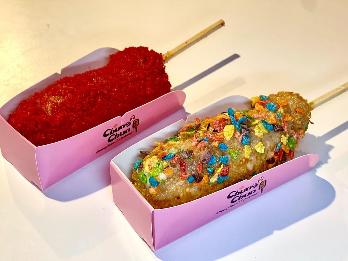 Hot Cheetos Corn Dog and Fruity Pebbles Corn Dog from DongYangMarket at 3101 Clays Mill Road in the Stonewall Shopping Center in Lexington.