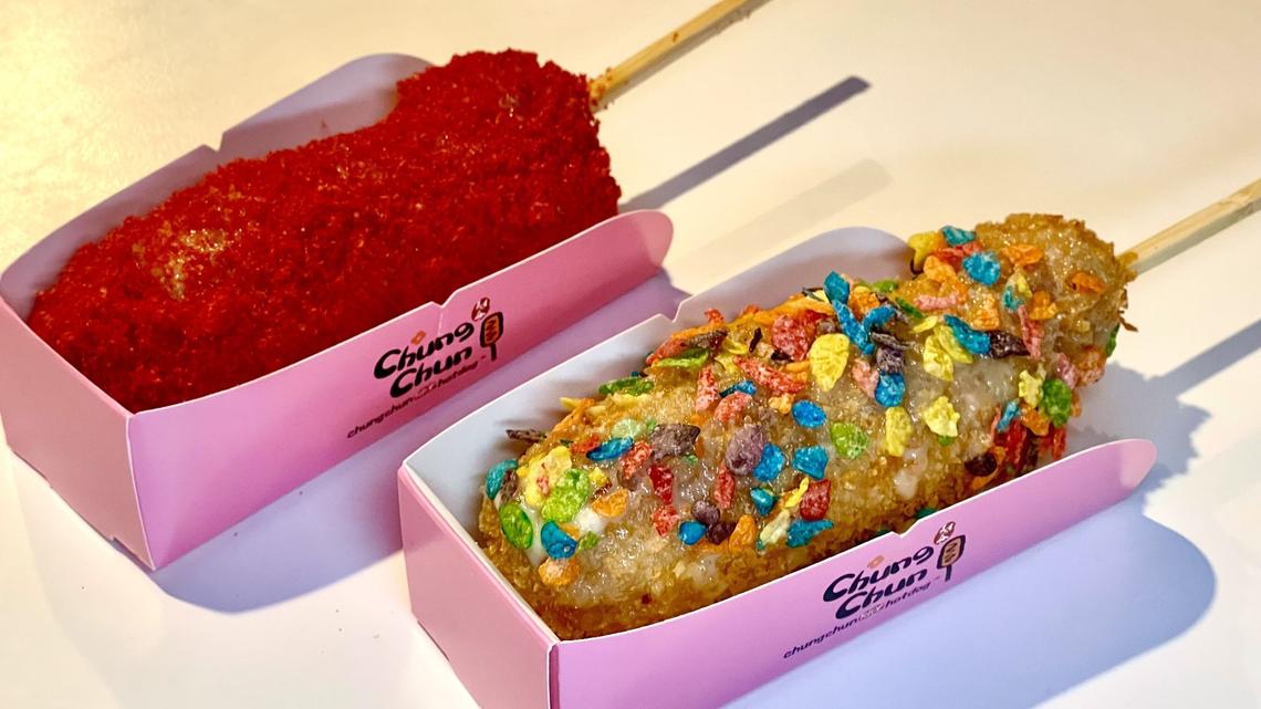 Hot Cheetos Corn Dog and Fruity Pebbles Corn Dog from DongYangMarket at 3101 Clays Mill Road in the Stonewall Shopping Center in Lexington.