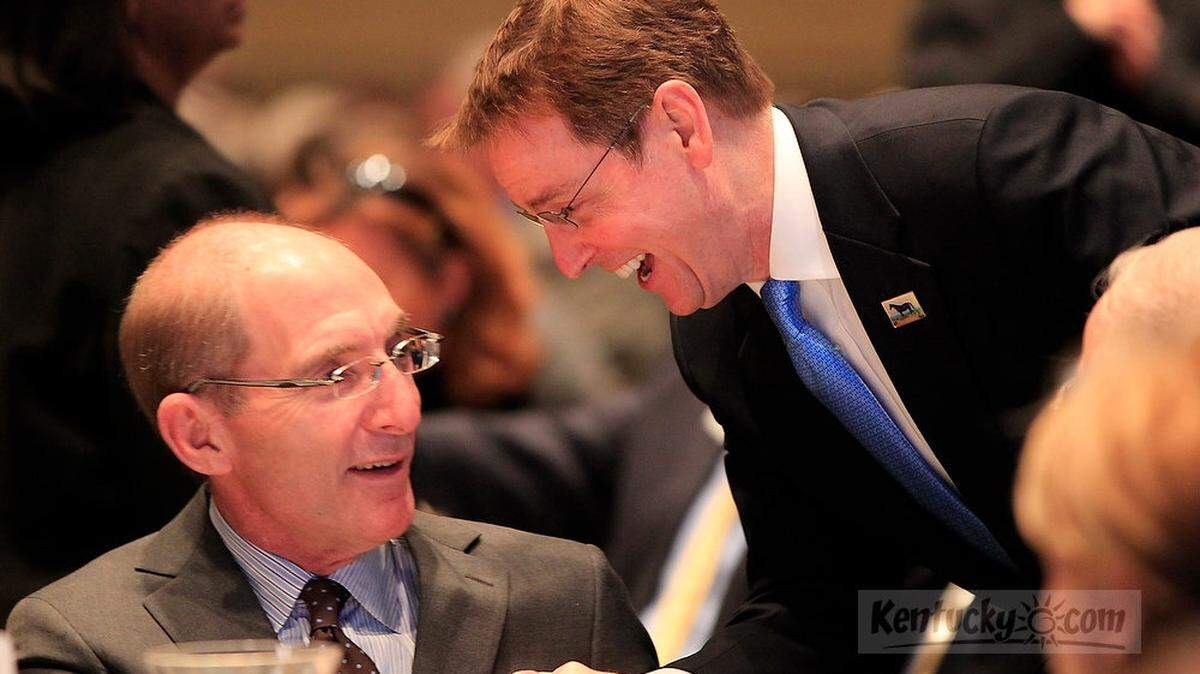 Mayor Jim Gray, right, greeted University of Kentucky President Eli Capilouto at a Lexington Forum luncheon on Jan. 24, 2012.