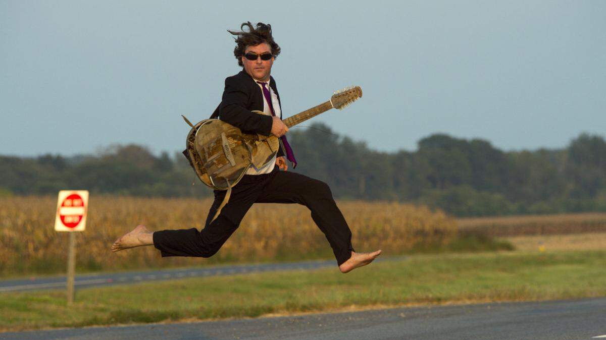 Keller Williams, who creates an ensemble performance as a solo act by recording and looping different instruments live, is returning to shows. His latest album was recorded on his cellphone.