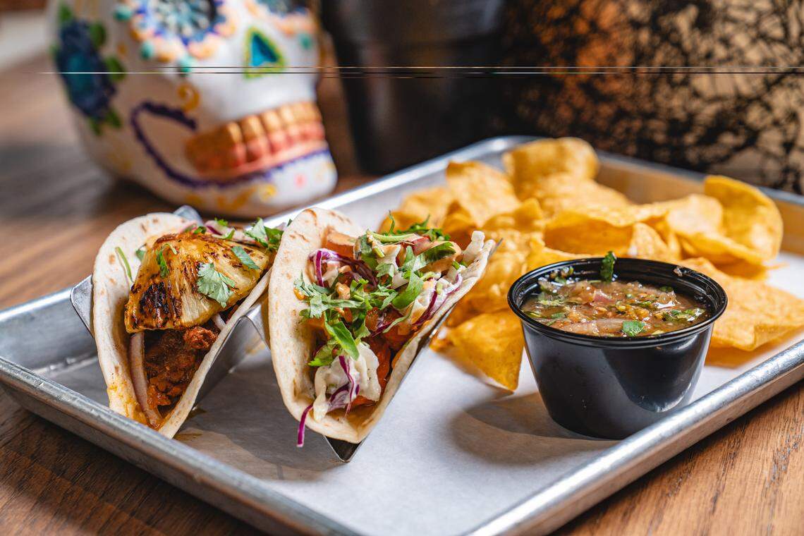 Desperados Cantina’s Chochinita Pibil Taco, left, and Chamoy Shrimp Taco
