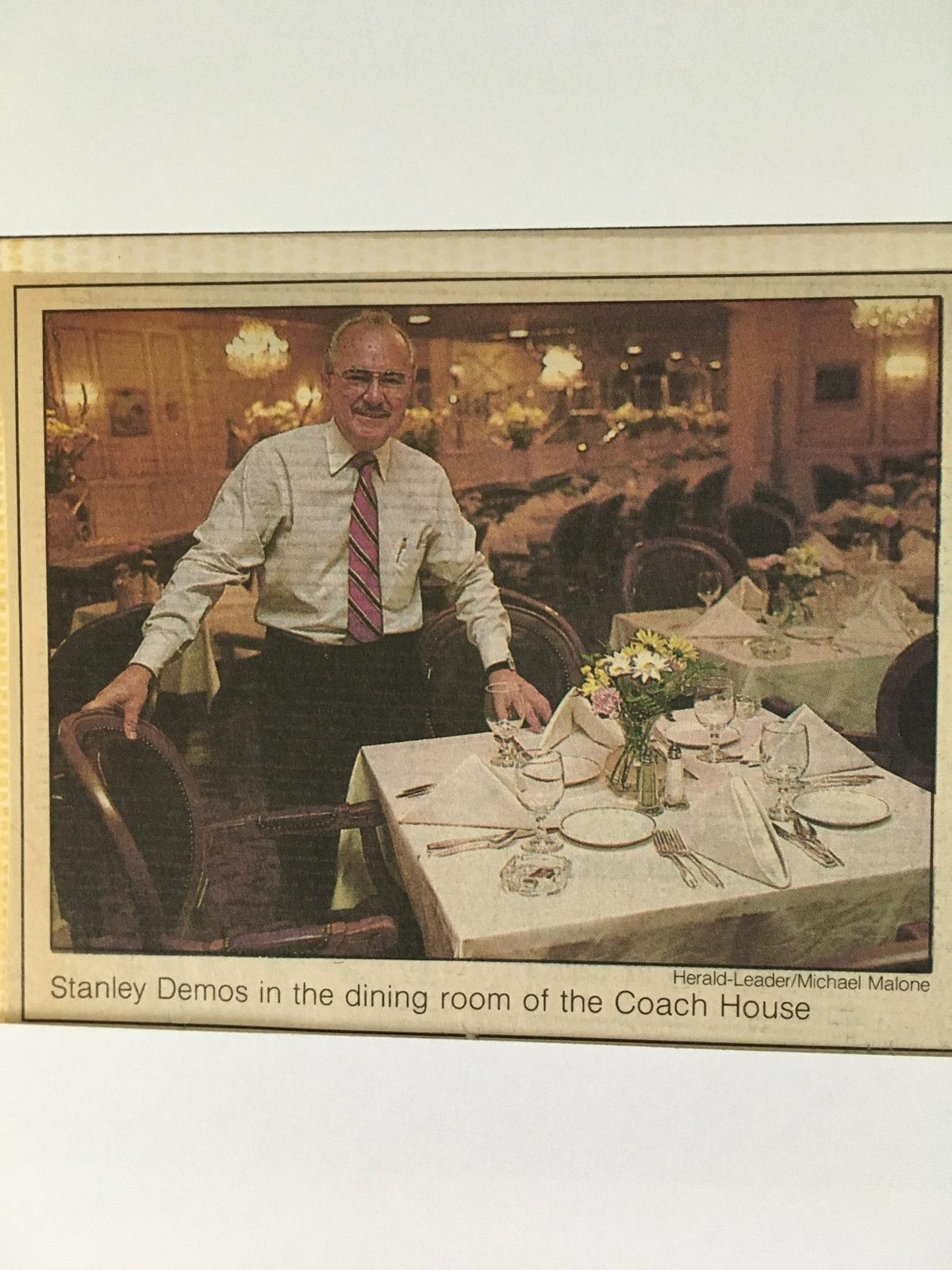Herald-Leader photo of Stanley Demos in the restaurant dining room, framed on his wall.