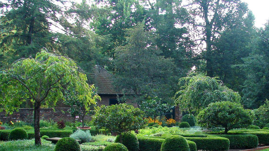 Boxwoods provide borders and background for splashes of perennial color in the walled garden at Ashland, the Henry Clay Estate, in Lexington.
