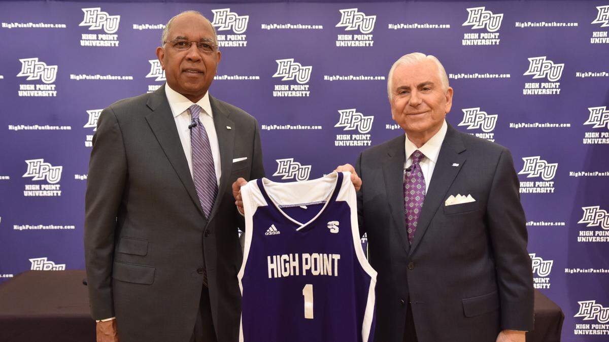 Tubby Smith posed with High Point President Nido R. Qubein when Smith was introduced as the school’s new basketball coach. Qubein was a senior at High Point when Smith was a freshman in 1969-70.