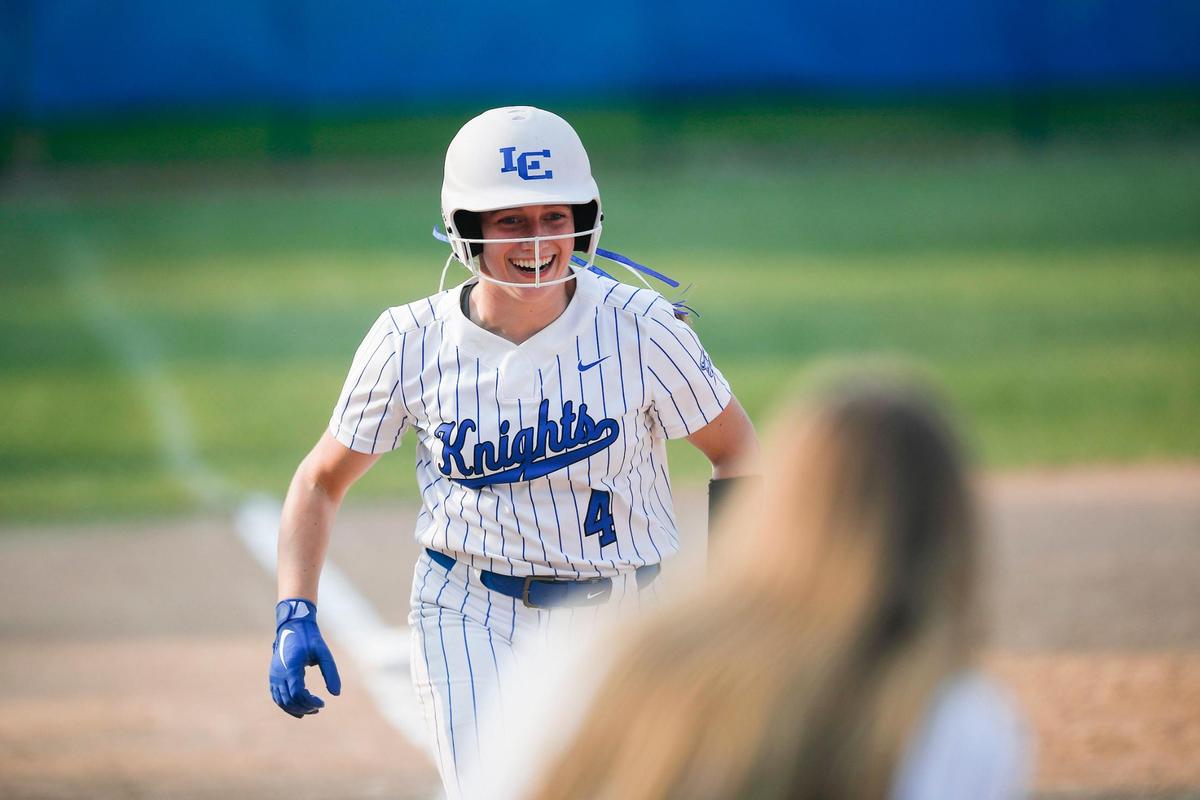 Lexington Catholic softball player Abby Hammond (4) and her cousin, Sacred Heart Academy tennis star Ellie Hammond, could both end this month with state championships in hand. Abby will play collegiately at UK and Ellie at Davidson.