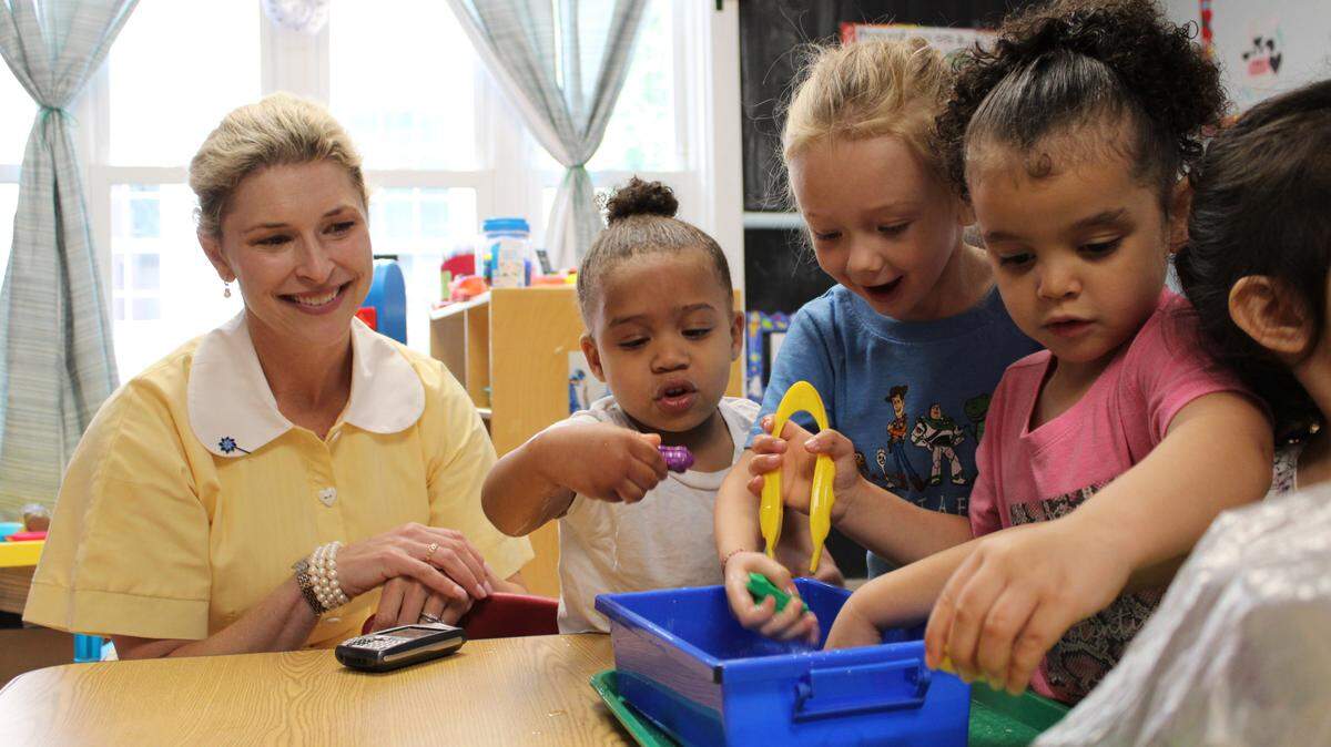 First lady Britainy Beshear plays with children at The Nest on June 5, 2024 in Lexington, Kentucky.