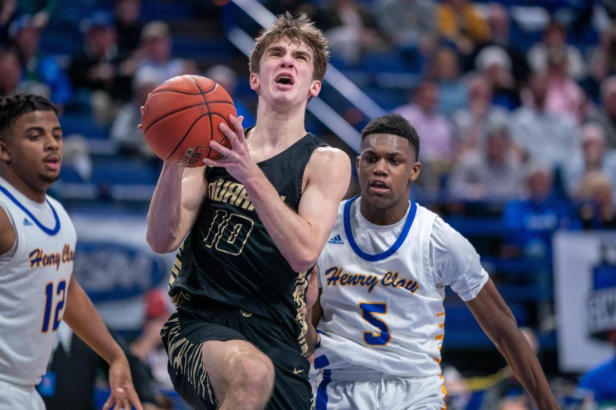 Grant Whitaker (10) scored 20 points Thursday night to lead Murray past Henry Clay in the first round of the Sweet 16 state tournament in Rupp Arena.