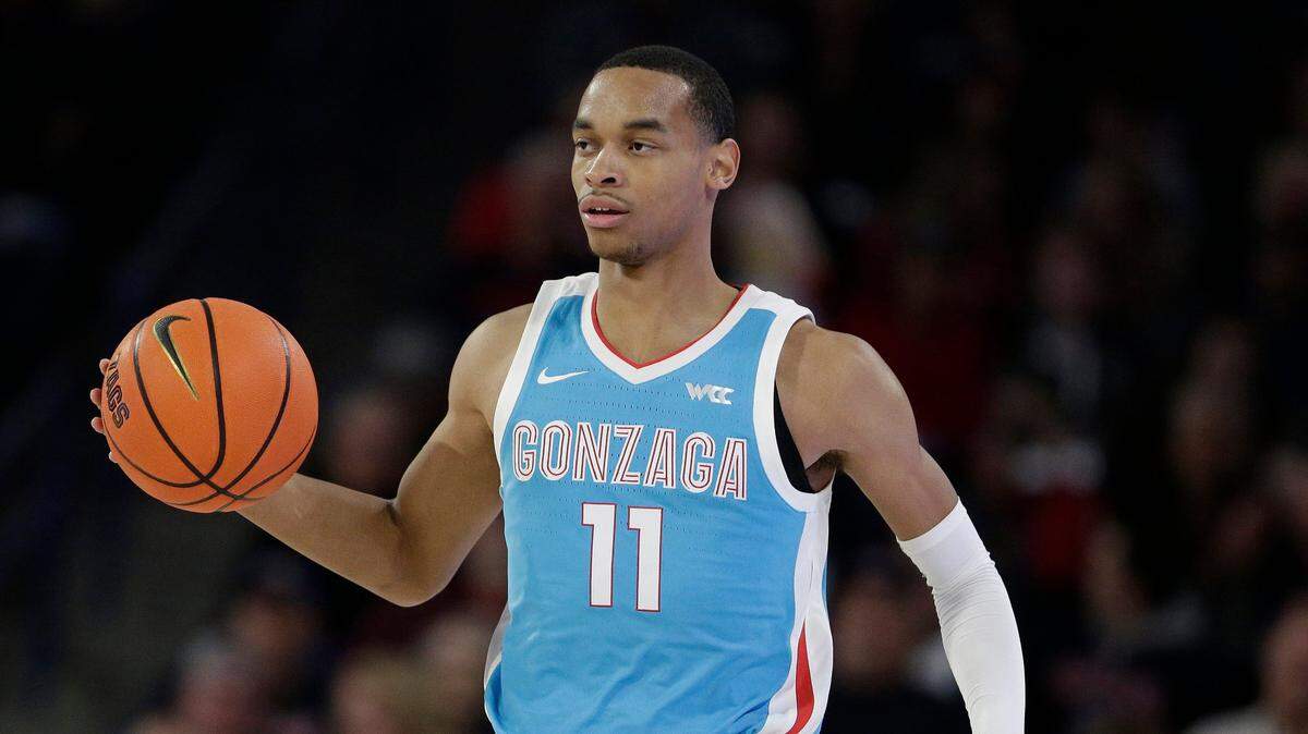 Former Kentucky signee Nolan Hickman (11) is averaging 8.0 points a game and has eight assists vs. eight turnovers through three games for Gonzaga.