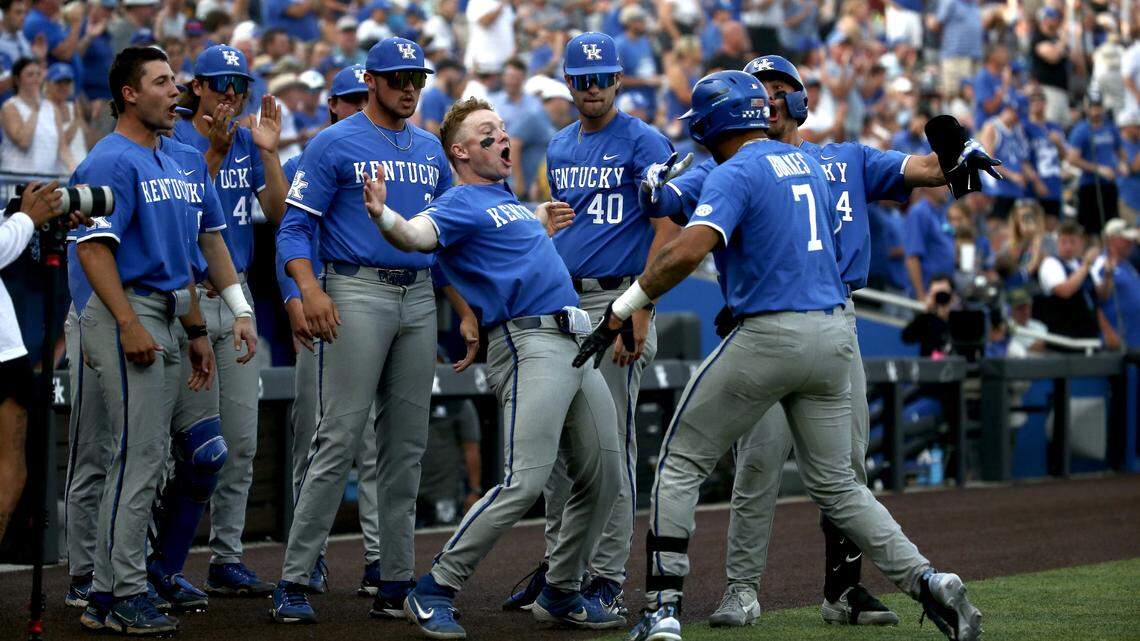 Kentucky’s Devin Burkes (7) and his teammates celebrate after his two-run home run against Indiana in the Lexington Regional of the NCAA Tournament on Sunday evening.