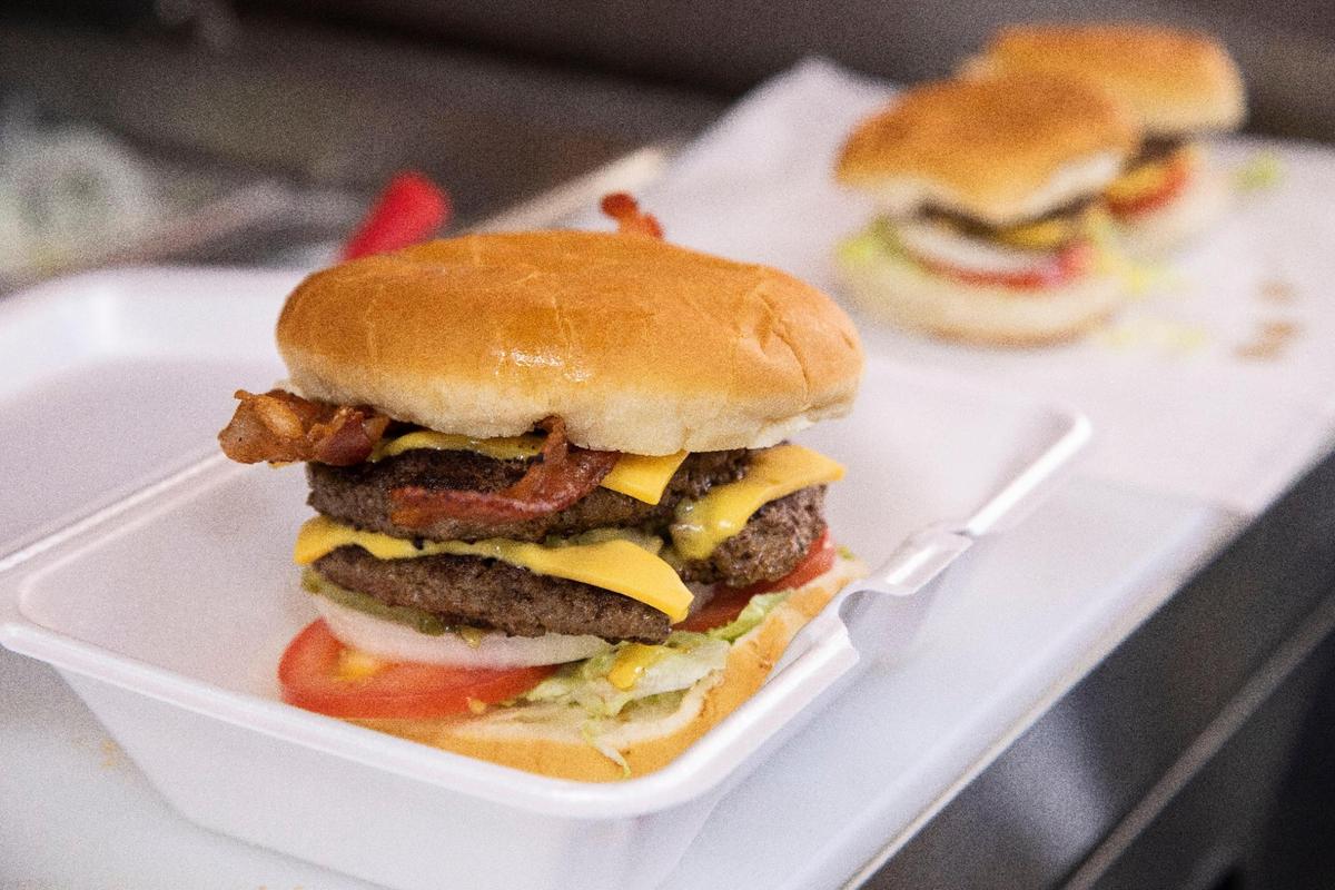One of the top sellers at Pat’s Snack Bar in Manchester: The burgers, which are made to order and come as sliders, singles, doubles, triples or as one-pound monster patties.