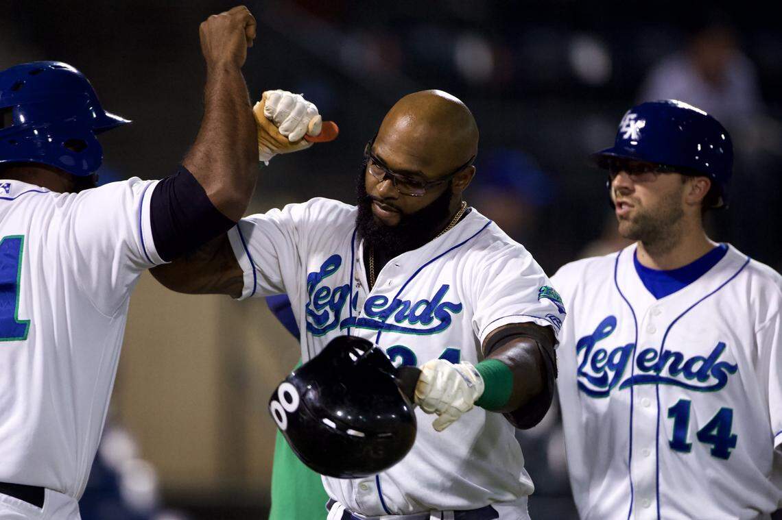 Courtney Hawkins (24) celebrated with Legends teammates after one of his three home runs Tuesday night in Lexington. The Legends won the Atlantic League of Professional Baseball Championship Series three games to one over the Long Island (N.Y.) Ducks.