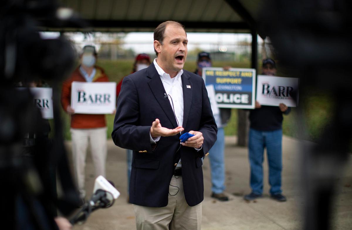 Rep. Andy Barr speaks with reporters and some of his supporters before voting at the Senior Center in Lexington, Ky., Tuesday, October 27, 2020.