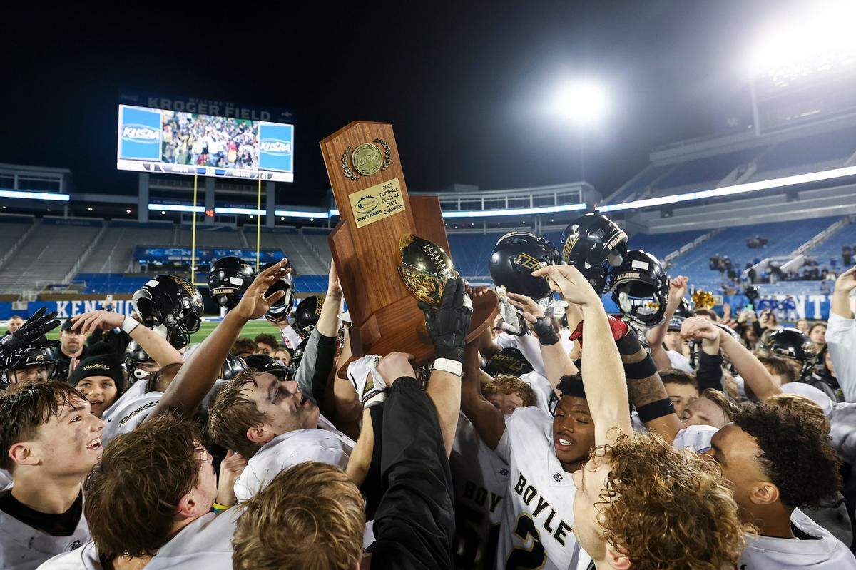 Boyle County celebrates its fourth championship in a row after defeating Covington Catholic in the Class 4A finals at Kroger Field on Dec. 1, 2023.