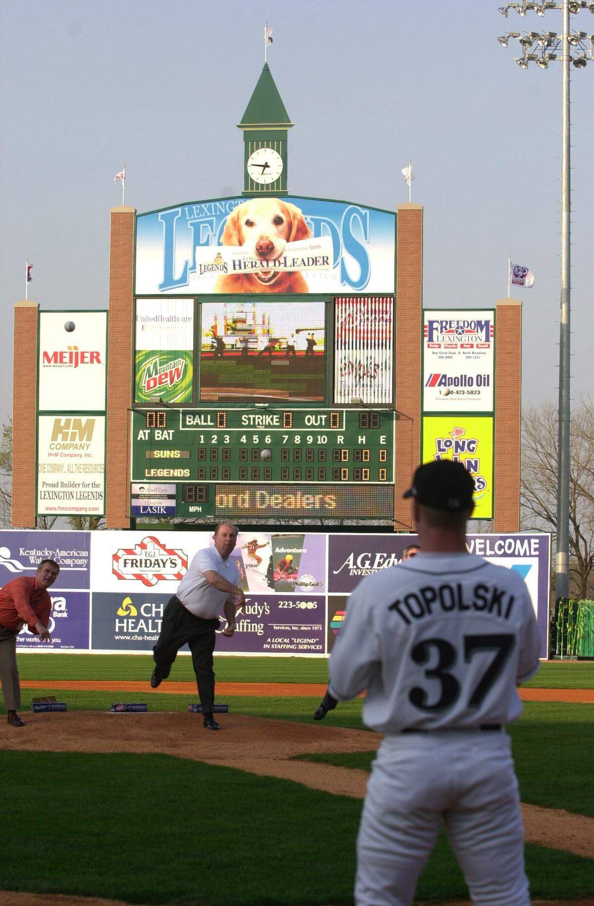 Lexington Herald-Leader publisher Tim Kelly throws one of the ceremonial first pitches at the Lexington Legends home opener Monday April 9, 2001 in Lexington, Kentucky. Keyword: Lexington Legends, baseball stadium, baseball field, Applebee’s Park and opening day and opening night.