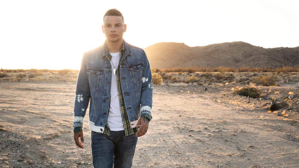 At 24, country singer Kane Brown is making history as a chart topper