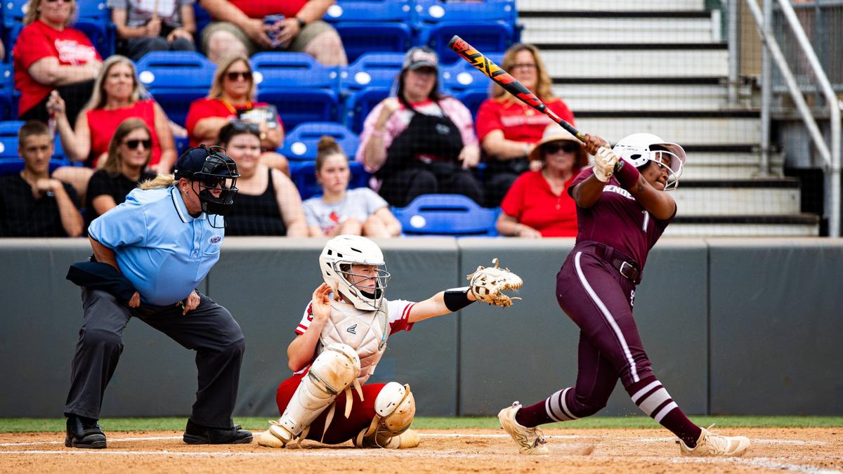 Henderson County’s Saniya Shields struck a base hit during the KHSAA State Softball Tournament semifinals game against Scott County at the University of Kentucky’s John Cropp Stadium on Friday.