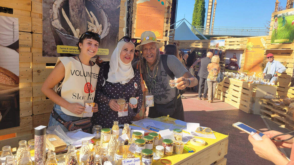 Jim Embry with exhibitors at a recent Terra Madre conference in Italy to highlight the Slow Food Movement.