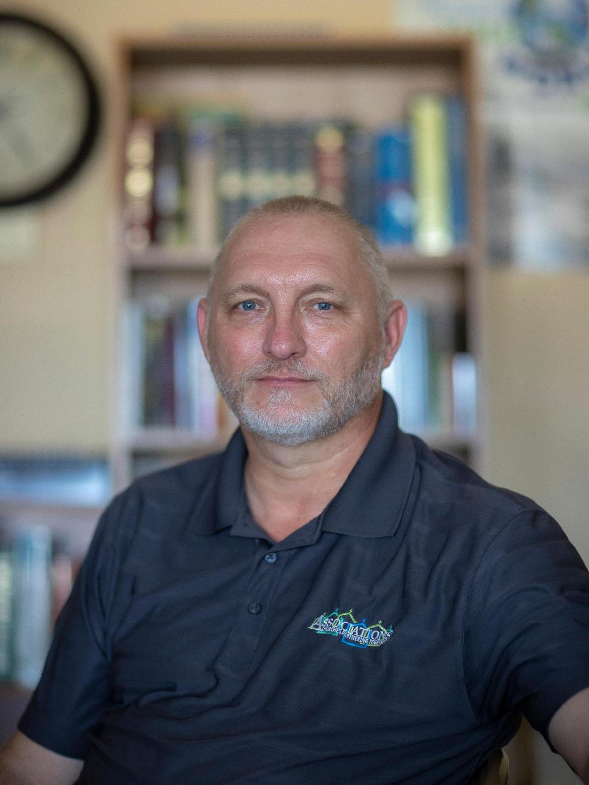 Nick Catron, Wayne/Freedom Association of Southern Baptist Churches director of missions, poses for a portrait at his office in Monticello, Ky., on Thursday, June 9, 2022.