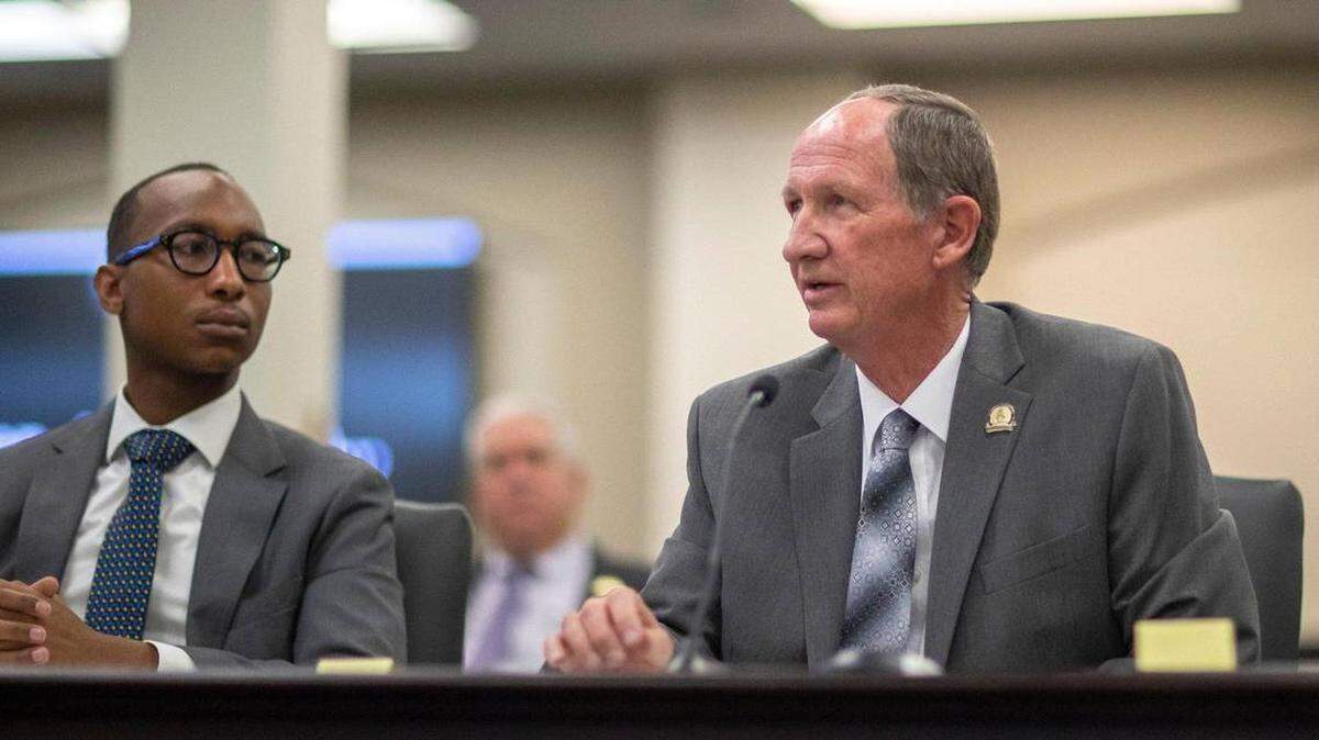 Darian Harris, an associate at Advantage Capital, watches as Rep. Richard Heath presents a tax incentives bill his employer wants to the House Agriculture Committee in January.