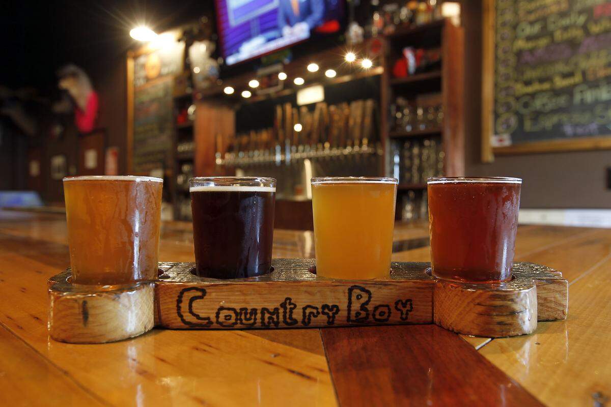 A beer flight consisting of Country Boy beers including Cougar Bait, Our Daily Red, Mango Belgian Wheat and Guatemalan Coffee Amber. Country Boy Brewing is opening a second Lexington taproom in PKL Lex off Winchester and Walton.