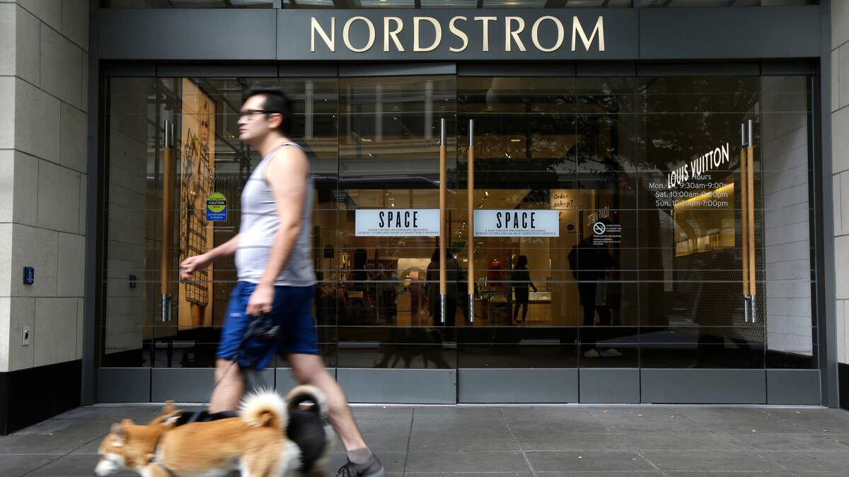 Nordstrom touts its ability to meet its customers in-store, online or curbside. A pedestrian walks past an entrance for Nordstrom Inc.’s flagship store in downtown Seattle in 2017.