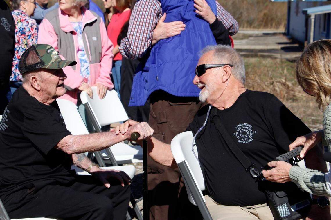 J.R. Kimberlin, 75, right, a former Westmoreland rescue team lead, is reunited with Bill Person, 89, the Westmoreland rescue team captain, at the 50th memorial service for the 26 victims of the Scotia mine disaster in Eastern Kentucky March 9, 2026.