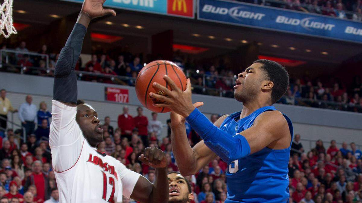 Kentucky guard Andrew Harrison drives to the basket in the first  half.          The University of Louisville hosted the University of Kentucky,  Saturday, Dec. 27, 2014 at Yum Center in Louisville.