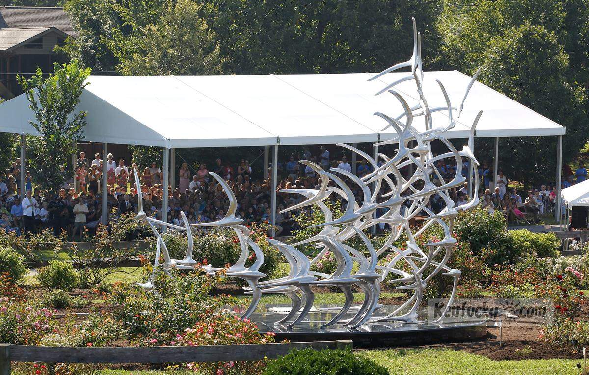 The sculpture was unveiled during the dedication of the 5191 Memorial held in The Arboretum, State Botanical Garden of Kentucky on Alumni Dr. in Lexington, Ky., Saturday, August 27, 2011.   More than 600 people, many of them family members of the victims, came to see the sculpture unveiled. Douwe Blumberg created the piece to honor the 49 lives lost in the August 2006 crash of Comair Flight 5191. Charles Bertram | Staff