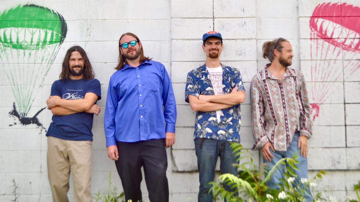 Restless Leg String Band is Jonathan Bramel, Joe Schlaak, Ishi Wooton, and Casey Baumgardner.