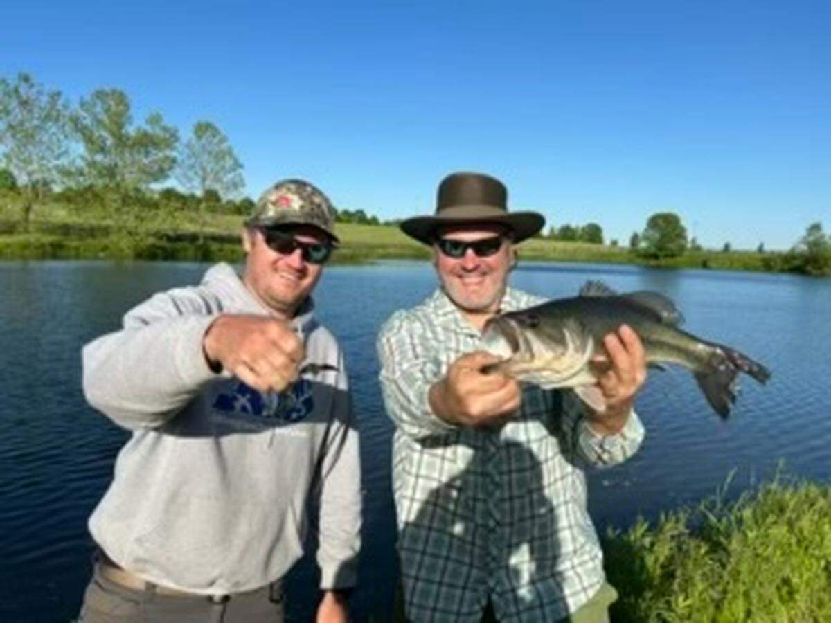 Musician Arthur Hancock with Ethan Massa, who won a Fishin’ with a Musician experience through Can’d Aid that raises money to provide musical instruments for children. They fished on the Hancock family’s Stone Farm, which raises Thoroughbreds.