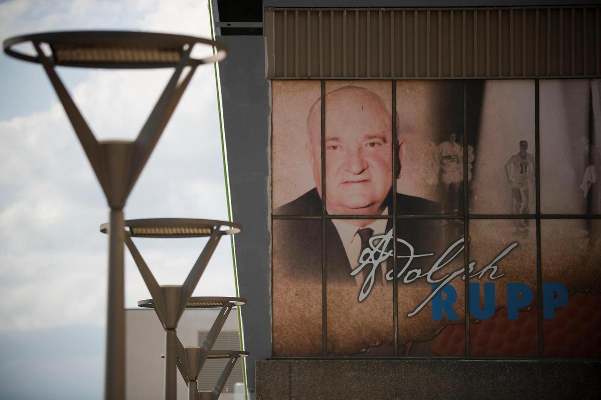 A mural of Adolph Rupp greets visitors to Rupp Arena along West High Street in Lexington. The arena and the attached Lexington Convention Center are undergoing renovations while discussion continues about renaming the venue.