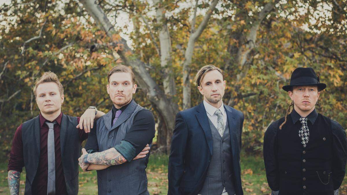 The current Shinedown lineup consists of Zach Myers, left, Brent Smith, Eric Bass and Barry Kerch. Smith and Kerch are the only founding members still with the band, which got its start in 2001.
