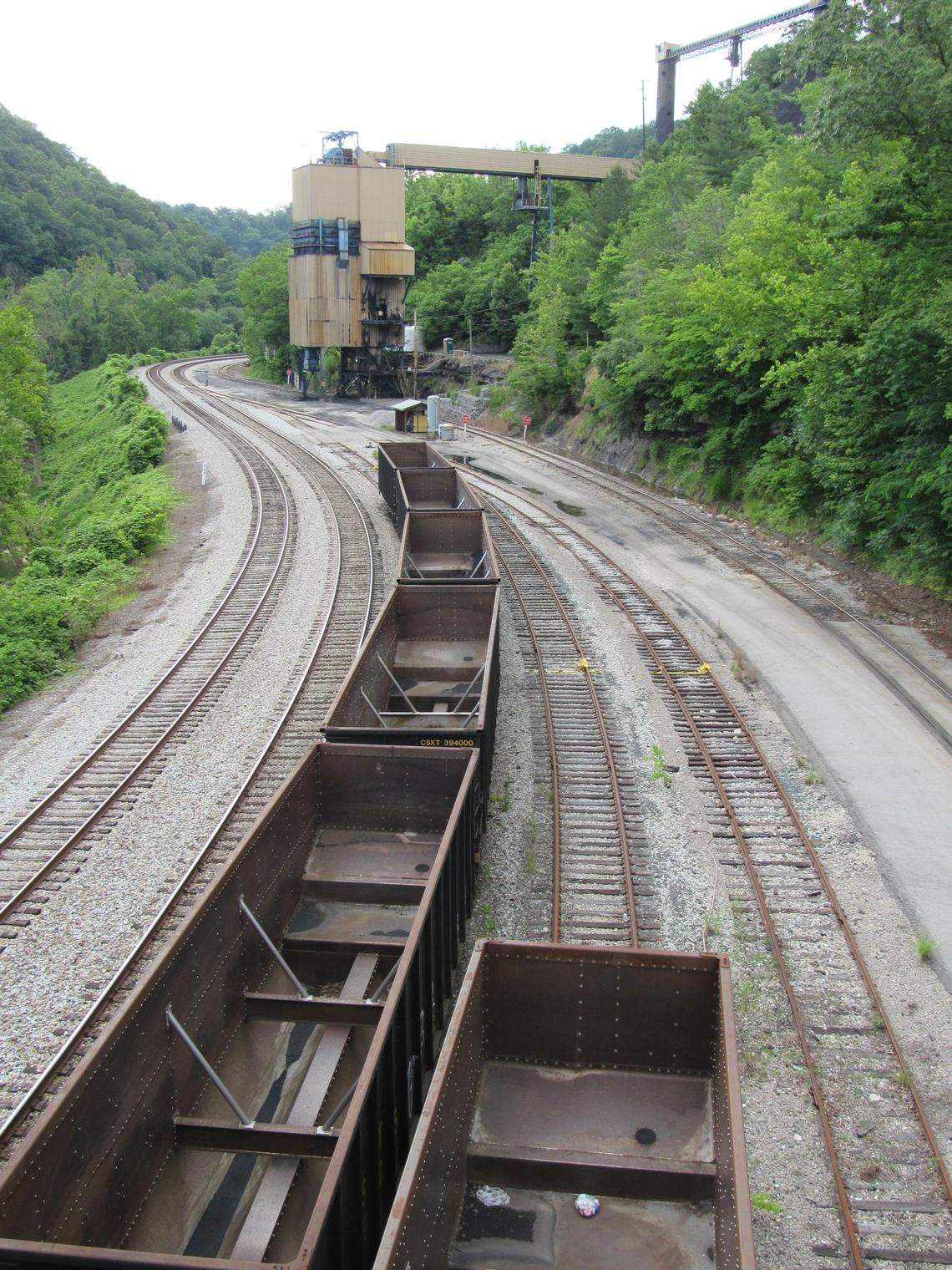 Coal rail cars sit empty on tracks at a loading facility near Hazard in 2017.