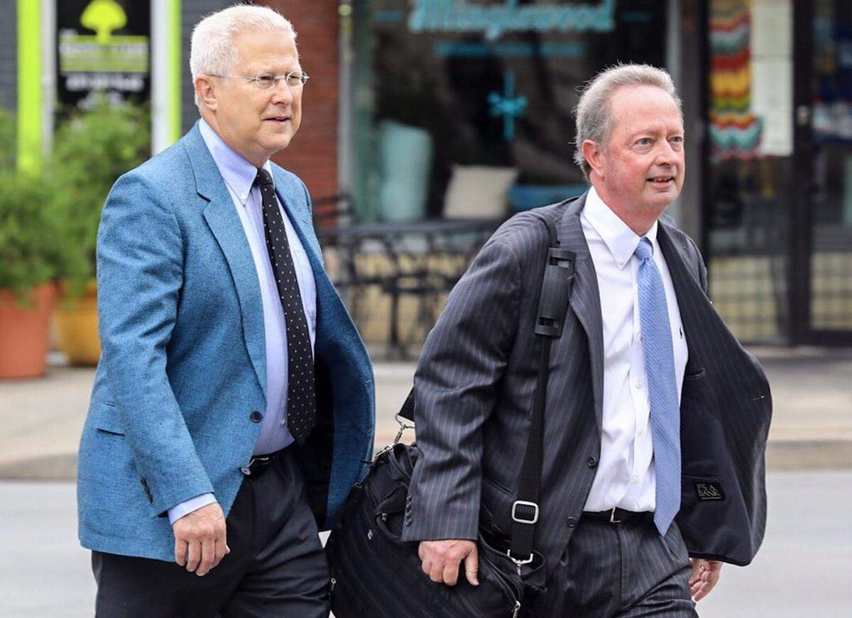 Timothy Wayne Wellman, left, walks with his lawyer Kent Wicker to appear at an arraignment in federal court in Lexington on charges that he lied about campaign contributions to Lexington council members. Wellman pleaded not guilty on June 19, 2019.