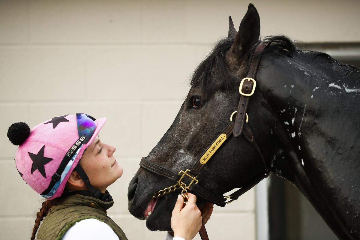 Exercise rider Ashlie Campbell comforted Kentucky Derby contender Gray Magician as he was bathed at Churchill Downs in preparation for Saturday’s race.